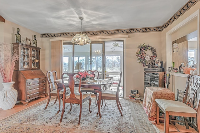 310 Par Ln, Greeneville, TN 37743 - dining space with ceiling fan with notable chandelier, light wood-type flooring, and a wealth of natural light