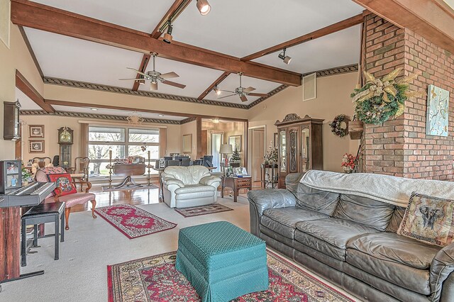 310 Par Ln, Greeneville, TN 37743 - carpeted living area featuring track lighting, a ceiling fan, and vaulted ceiling with beams