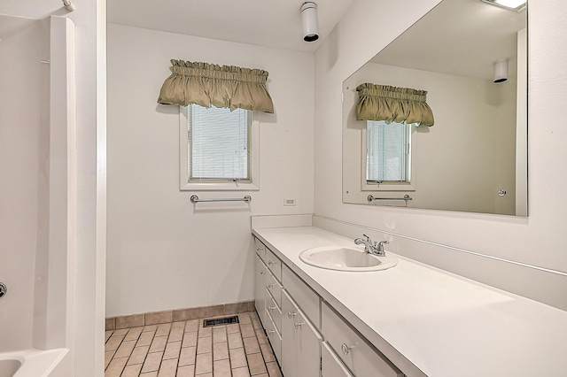 310 Par Ln, Greeneville, TN 37743 - bathroom with baseboards, a wealth of natural light, vanity, and visible vents