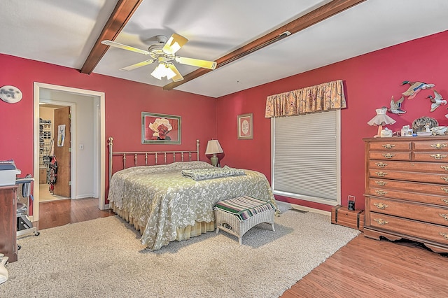 310 Par Ln, Greeneville, TN 37743 - bedroom featuring baseboards, a ceiling fan, beamed ceiling, and wood finished floors