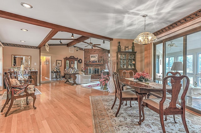 310 Par Ln, Greeneville, TN 37743 - dining space with beam ceiling, light wood finished floors, a fireplace, ceiling fan with notable chandelier, and recessed lighting