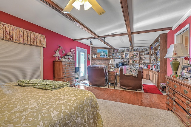 310 Par Ln, Greeneville, TN 37743 - bedroom featuring beamed ceiling, coffered ceiling, and wood finished floors