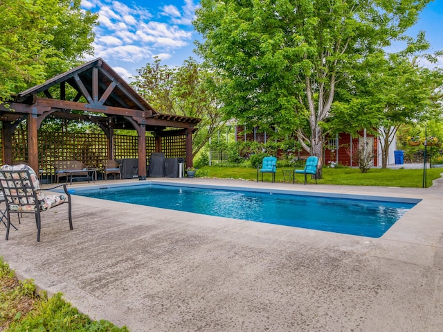 pool with a yard, a gazebo, and a patio area