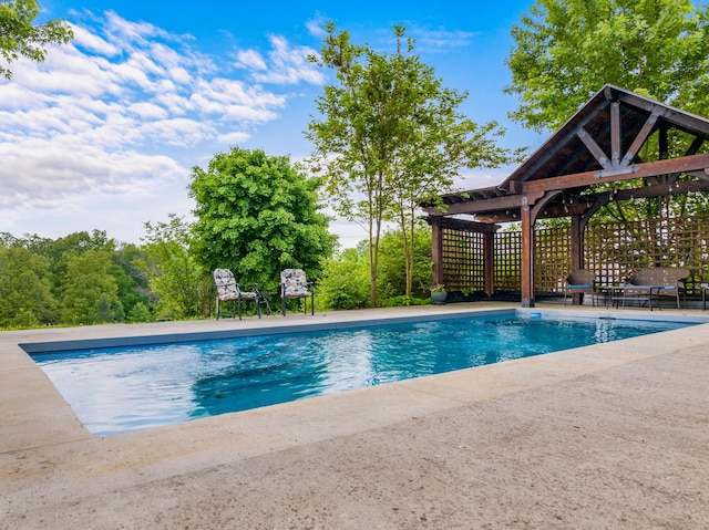pool featuring a patio area and a gazebo