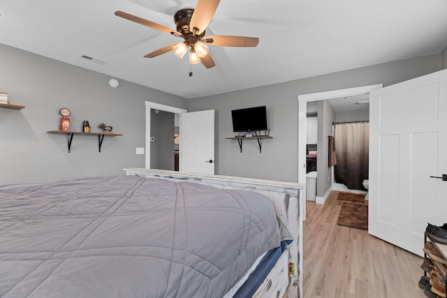 bedroom with light wood finished floors, ceiling fan, and baseboards
