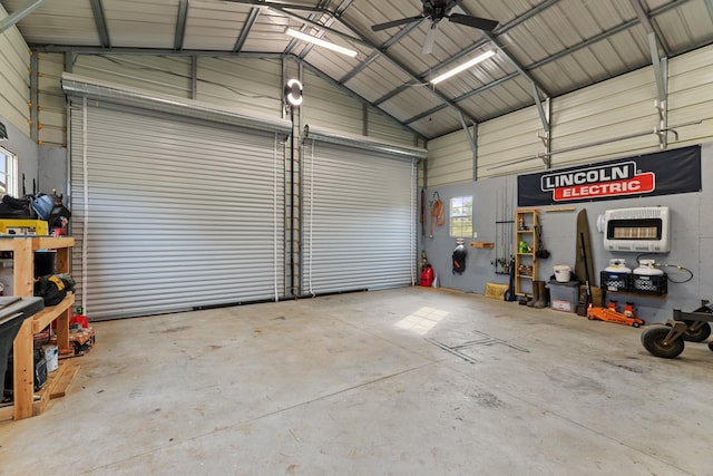 garage with ceiling fan and heating unit