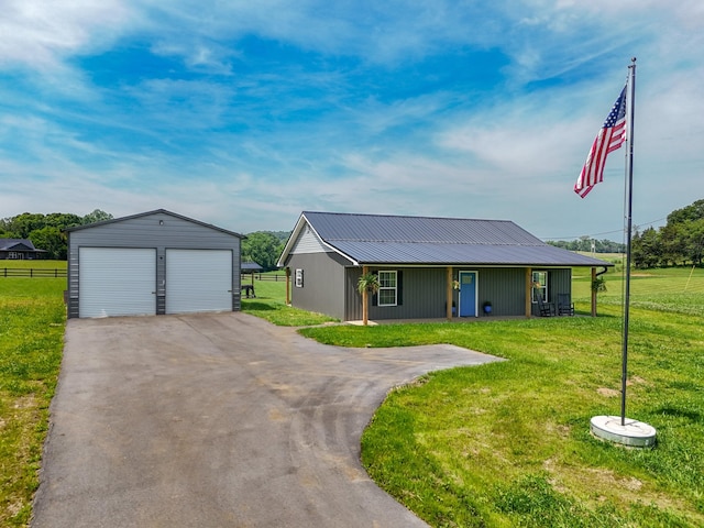 1131 Fate Rankin Rd, Jefferson City, TN 37760 - view of front of home featuring a garage, an outdoor structure, and a metal roof