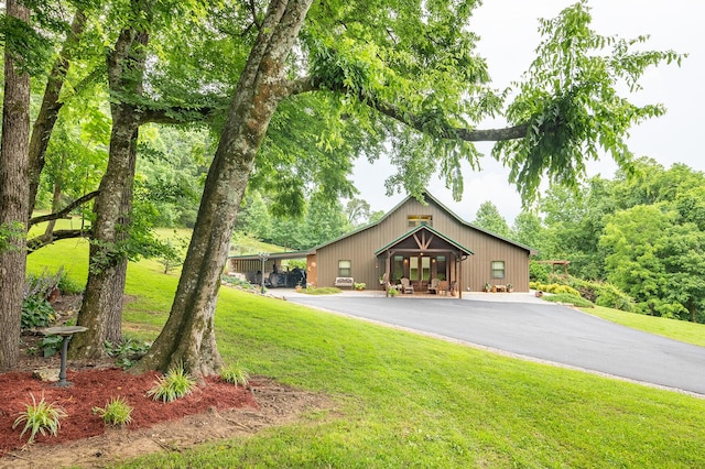 292 Burkhart Rd, Rutledge, TN 37861 - view of front of property with a front lawn and a detached garage