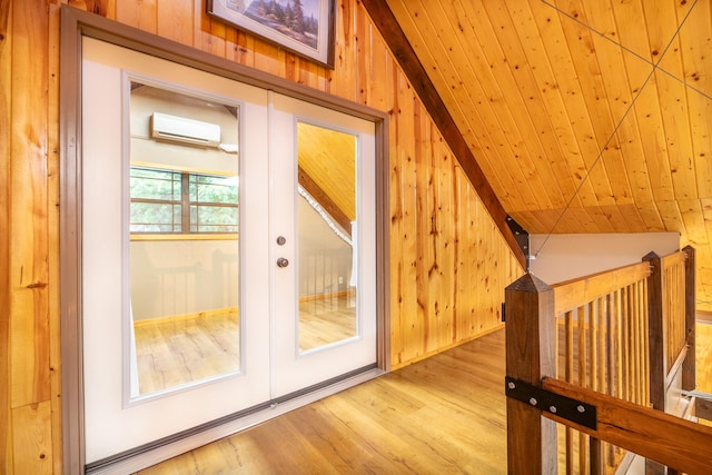 292 Burkhart Rd, Rutledge, TN 37861 - additional living space with a wall mounted AC, wood finished floors, french doors, and wood walls