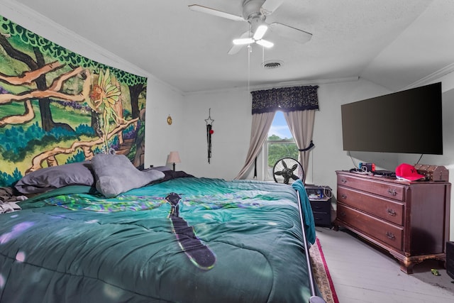 323 Pauline Ave, Morristown, TN 37813 - bedroom featuring light wood-style flooring, lofted ceiling, ornamental molding, a ceiling fan, and a textured ceiling