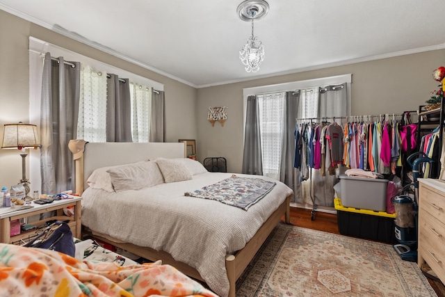 323 Pauline Ave, Morristown, TN 37813 - bedroom with ornamental molding and wood finished floors