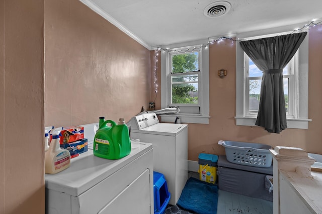 323 Pauline Ave, Morristown, TN 37813 - washroom featuring washing machine and clothes dryer and ornamental molding