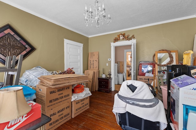 323 Pauline Ave, Morristown, TN 37813 - bedroom featuring crown molding, a chandelier, and hardwood / wood-style floors