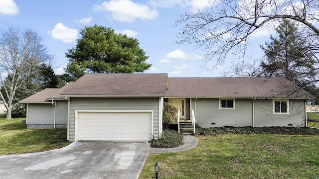 ranch-style home with a garage and a front lawn