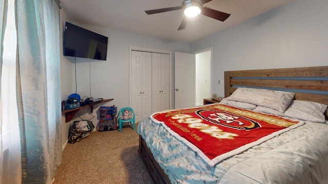 bedroom with a closet, ceiling fan, and carpet flooring