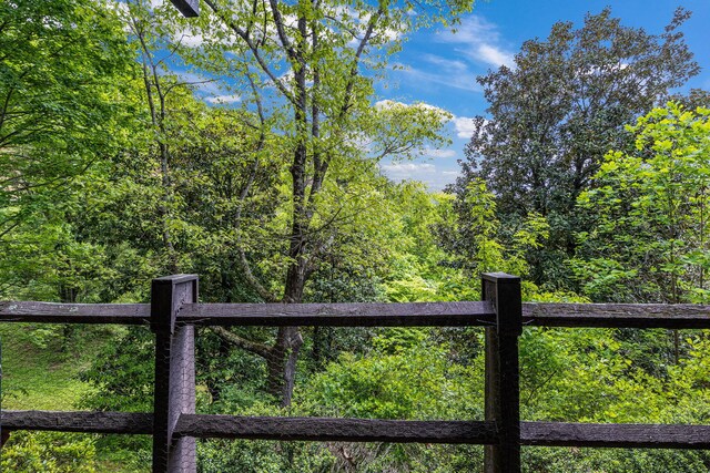 gate with fence and a view of trees