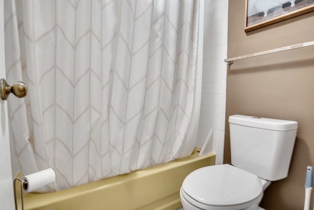 full bathroom with toilet and shower / bath combination with curtain
