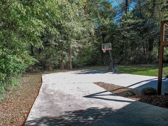 view of patio / terrace with basketball hoop