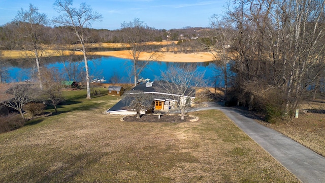 exterior space with a water view