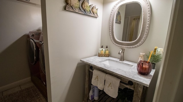 bathroom with tile patterned flooring and sink