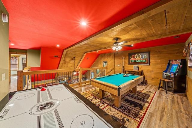 game room with wood ceiling, ceiling fan, wooden walls, hardwood / wood-style flooring, and pool table