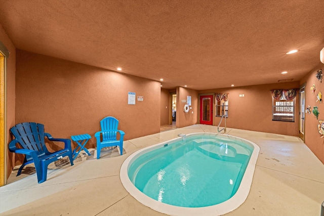 view of pool featuring a hot tub