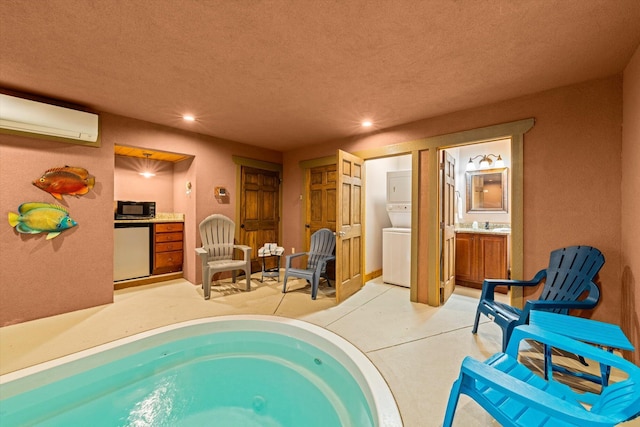 view of swimming pool featuring a wall mounted AC