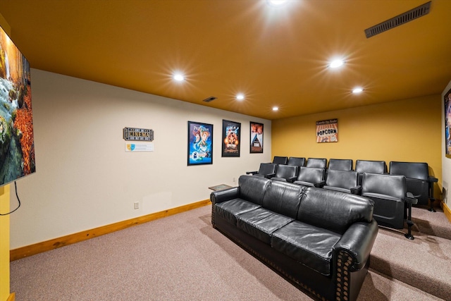 cinema room featuring carpet floors