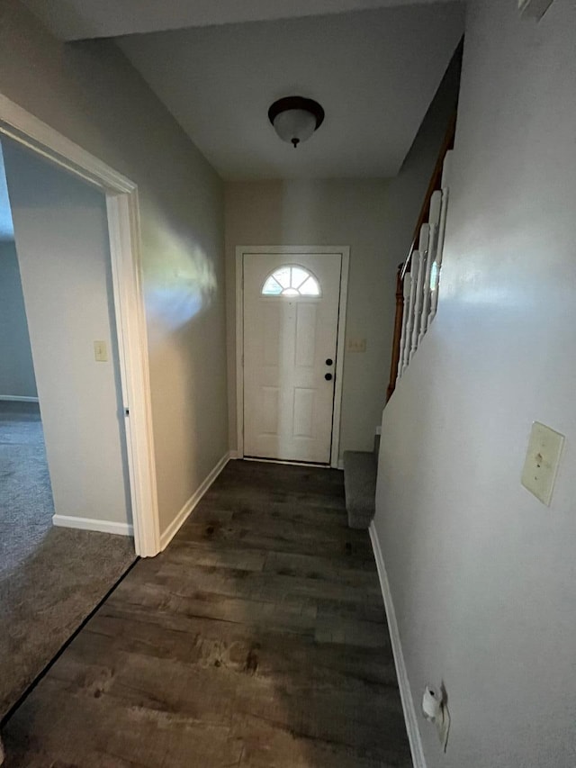 doorway to outside featuring dark hardwood / wood-style floors