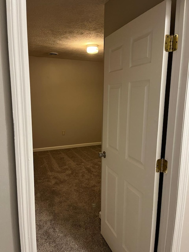 interior space featuring a textured ceiling