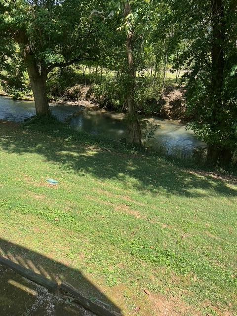 view of yard with a water view