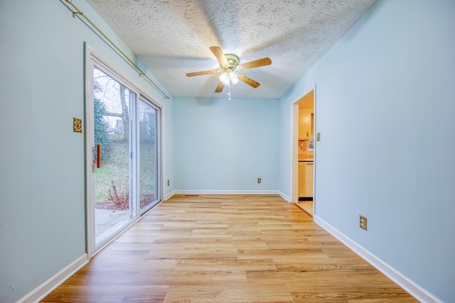 unfurnished room featuring ceiling fan, a textured ceiling, and light hardwood / wood-style floors