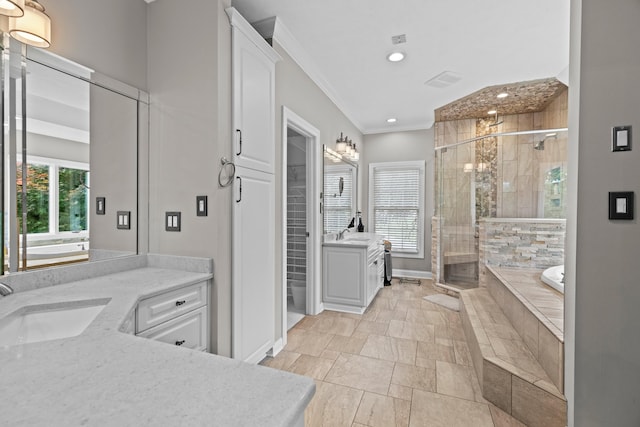 1647 Talon Ct, Talbott, TN 37877 - bathroom with healthy amount of natural light, a stall shower, two vanities, crown molding, and recessed lighting