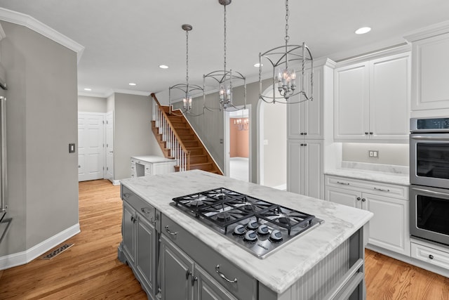 1647 Talon Ct, Talbott, TN 37877 - kitchen with gray cabinets, appliances with stainless steel finishes, a chandelier, white cabinets, and recessed lighting