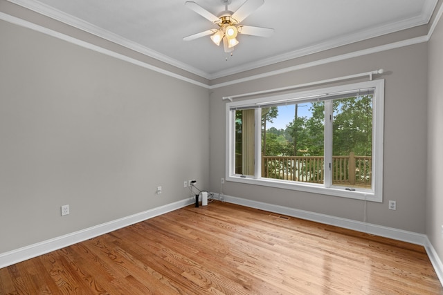 1647 Talon Ct, Talbott, TN 37877 - unfurnished room with baseboards, light wood-type flooring, a ceiling fan, and crown molding