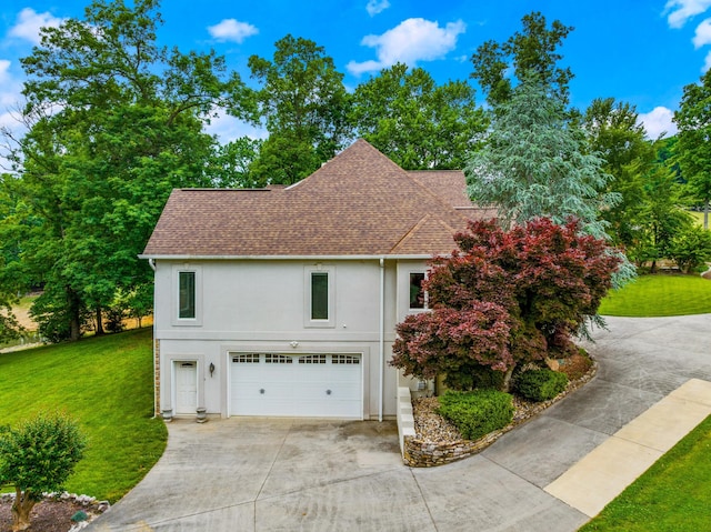1647 Talon Ct, Talbott, TN 37877 - view of side of property featuring roof with shingles, an attached garage, a lawn, and driveway
