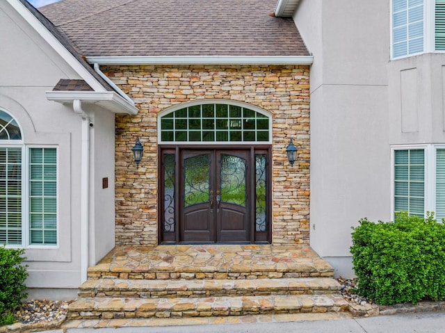 1647 Talon Ct, Talbott, TN 37877 - property entrance featuring stone siding, roof with shingles, french doors, and stucco siding