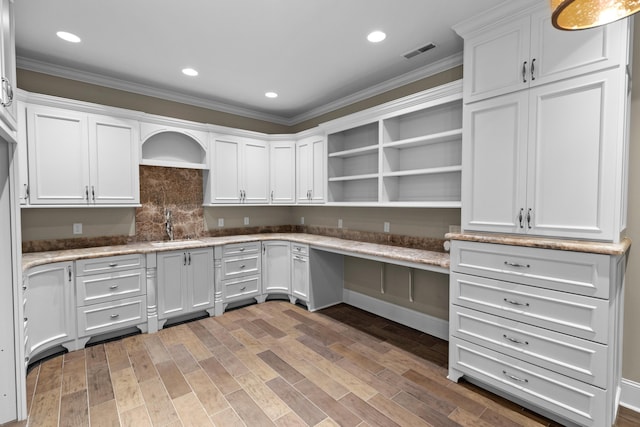 1647 Talon Ct, Talbott, TN 37877 - kitchen featuring open shelves, a sink, ornamental molding, white cabinets, and light wood-type flooring