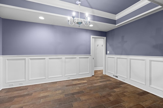 1647 Talon Ct, Talbott, TN 37877 - unfurnished room with a chandelier, a wainscoted wall, dark wood-style floors, a decorative wall, and recessed lighting