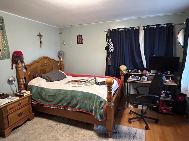 bedroom featuring light hardwood / wood-style floors