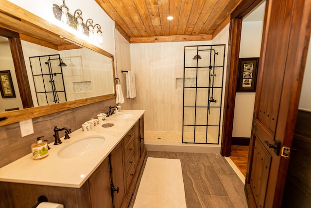 bathroom with vanity, hardwood / wood-style flooring, walk in shower, and wooden ceiling