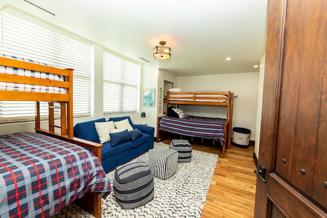 bedroom with light hardwood / wood-style flooring