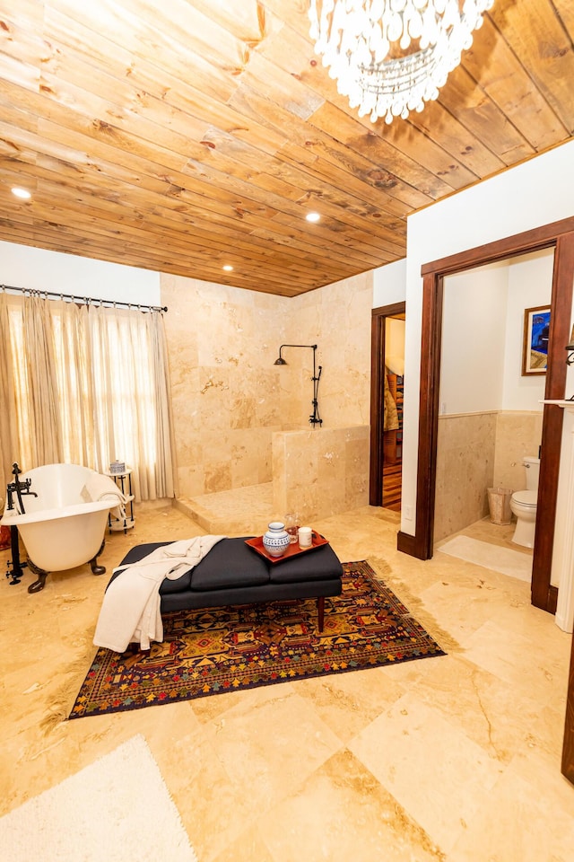 bathroom with a tub to relax in, wooden ceiling, tile walls, and toilet