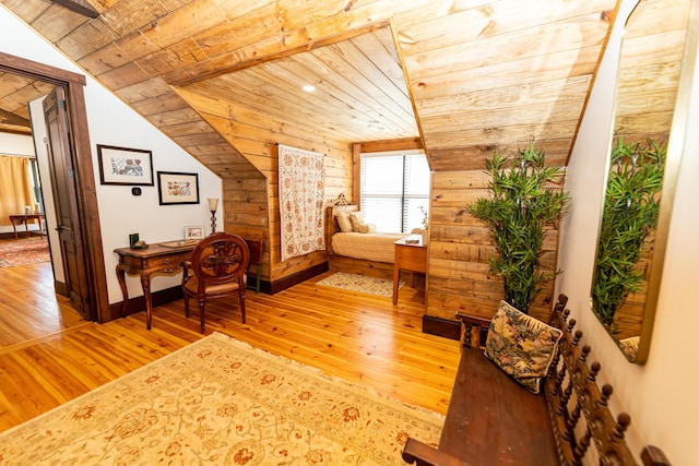 living area with wooden ceiling, lofted ceiling, and hardwood / wood-style flooring