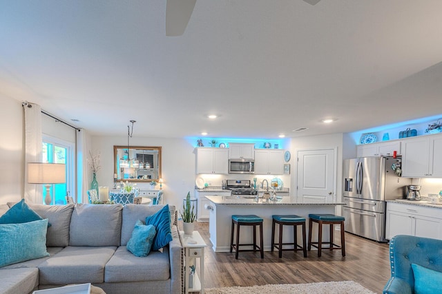 825 Greene Meadow Dr, Talbott, TN 37877 - living room with dark wood-style flooring, recessed lighting, and a ceiling fan