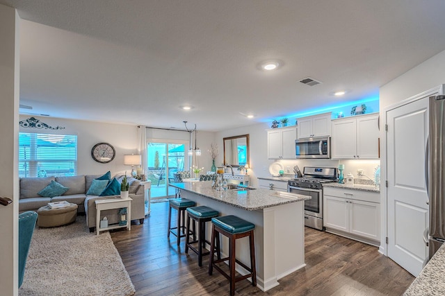 825 Greene Meadow Dr, Talbott, TN 37877 - kitchen with appliances with stainless steel finishes, healthy amount of natural light, dark wood-style floors, and recessed lighting