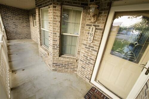 doorway to property featuring a porch