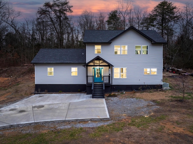 view of front of home with cooling unit