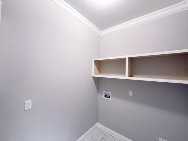 clothes washing area featuring washer hookup, marble finish floor, crown molding, laundry area, and baseboards