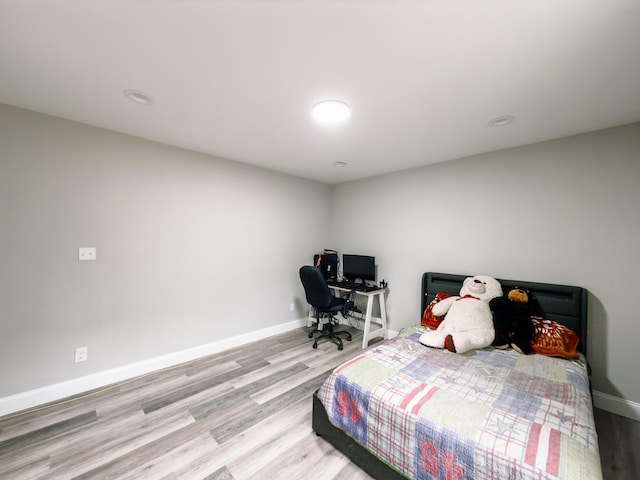 bedroom featuring light wood-type flooring